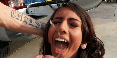 Petite Janice Griffith munches on a big white cock