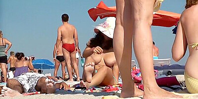 Hot Brunette with huge tits at beach