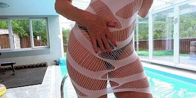 A red-hot 54-year-old',s tiny bikini and gaping pussy show