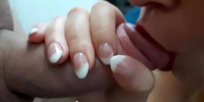 Lollipop lovin’ teenager is providing a head to a homie, in front of the camera