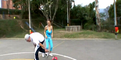 Paris Milan plays basketball outdoors