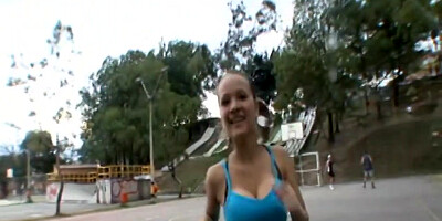 Paris Milan plays basketball outdoors