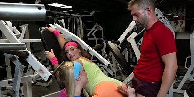 Fitness instructor and two babes are having 3some in the gym