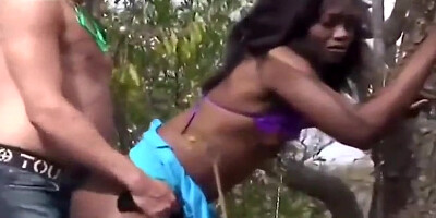 Timid African teenage enjoyments white meatpipe in the forest