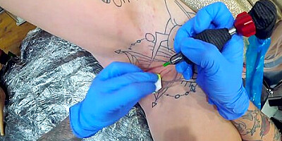 Inked up hottie Sully Savage has her clit tattooed