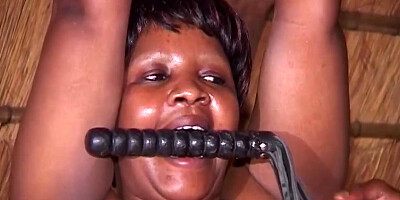 African female got strapped up and tormented last night and she loved it a plenty of