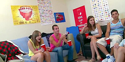 A dirty brunette college slut takes on two hard cocks in a dorm room