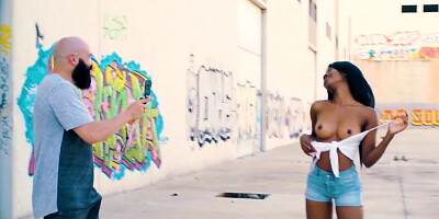 Spicy black girl Boni Brown sucks a hard cock on the street