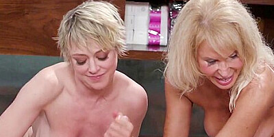 Busty blonde bitch and stepmom jerk one cock