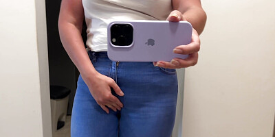 girk in jeans touching crotch