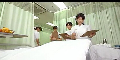 Japanese nurse shows other nurses how to give a handjob
