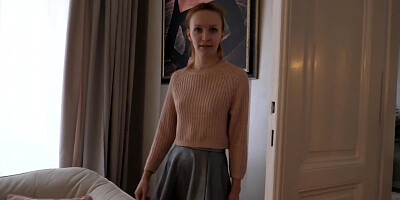 Petite young lady showing off her slender body