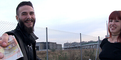 Redheaded girl bare her ample charms to her audience