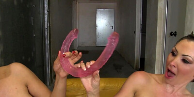 Busty Blondie Fesser and Yasmin Scott have fun with a sex toy