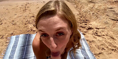 Busty redhead chick gives head and gets fucked on the beach