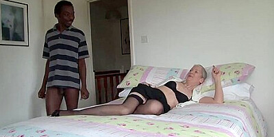 Two handsome, black guys are fucking a horny British granny, in the middle of the day