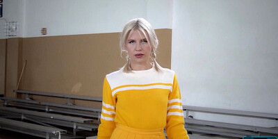 Petite blonde MILF cheerleader stripping