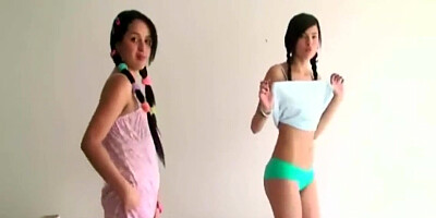 Diminutive teenies wank in a row together