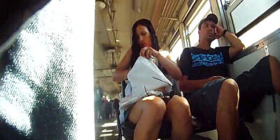 Upskirt video features a sexy young chick on a bus.
