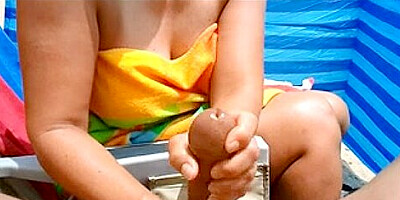 Compliation of Beach tugjob and large cumshots