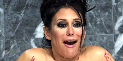 A busty milf with a sexy ass is getting rammed in the bathroom