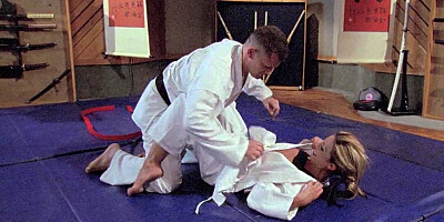Kirsten Price submits to her martial arts teacher