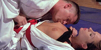 Kirsten Price submits to her martial arts teacher