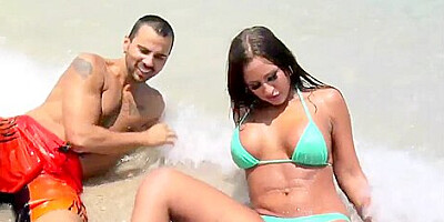 Sexy and young couple spend time near the water in beautiful place