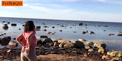 Brown-Haired in yoga trousers is deep-throating a random stranger's trouser snake on the beach, during the day