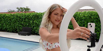 Naughty blonde fucked to the balls by the swimming pool