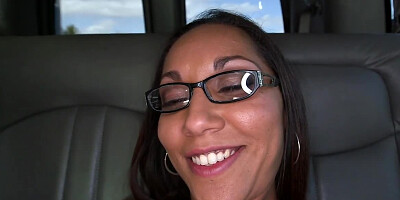 Nerdy Latina with small tits gives blowjob in moving minivan