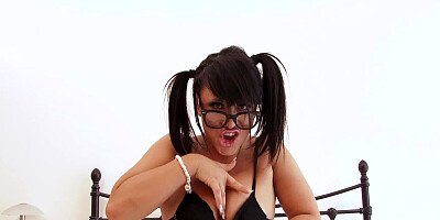 A nerdy chick demonstrates her masturbation games on camera