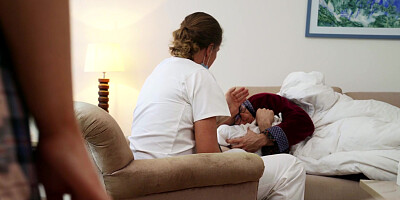 Nurse Gina Varney milks doc