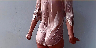 Wifey Wet Shirt and Braless with her perfect tits on show.