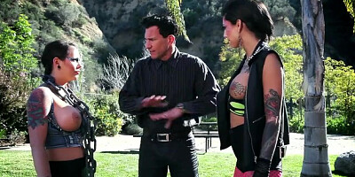 Two busty tatted sluts share one big dick in a hardcore threesome