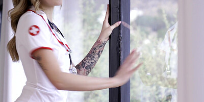 Charlotte Sins is posing in sexy nurse uniform