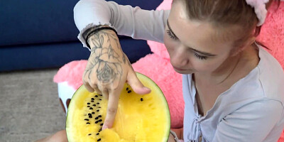 Drooling girl fingers watermelon before masturbating