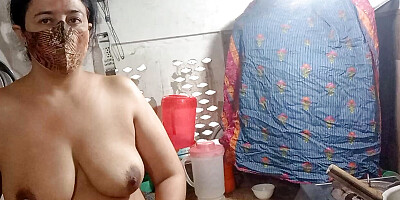 Lovely Pregnant Girl Making Tea in Kitchen Without Dress