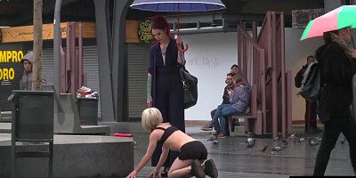 Public slut humiliated on the street by her strict domina