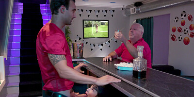 Kitty Carrera is sucking Alex Legend's cock under the bar stand