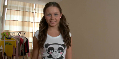 A lovely young woman is by herself with her sweet sex toys