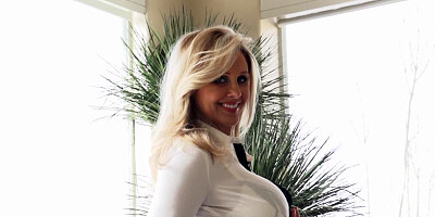 Milf in a blouse and skirt seduces his dick for hot sex