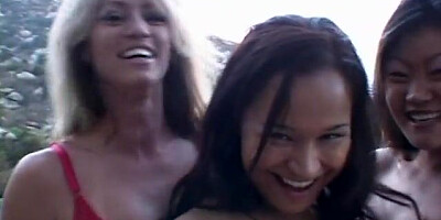 Sexy lesbian threesome in the open