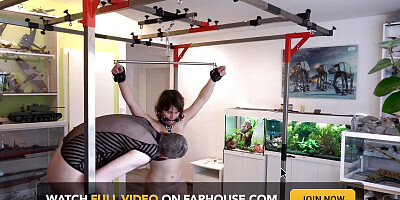 Slave Girl Brought to Orgasm While Hanging with a Spreader Bar
