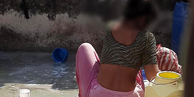 Desi bhabhi showed her burr and nipple to her brother-in-law and went to take a bath in the open bathroom