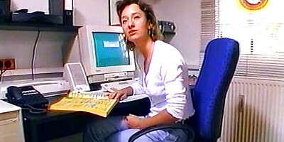 Sexy German secretary sucks and jerks off a dick in the office