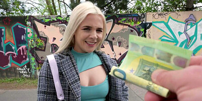 Ellie Shou is getting picked up outdoors