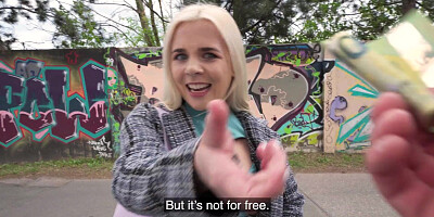 Ellie Shou is getting picked up outdoors