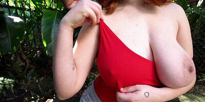 Annabel Redd demonstrates her big tits outdoors