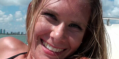 A bimbo with a bikini is on a boat where she is getting penetrated